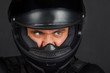 Biker in a helmet with a aggressive facial expression