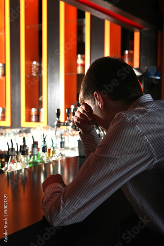 Photo: Sad Young Man at the Bar Sad Young Man at the Bar