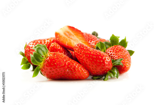 Photo: Strawberries with leaves. Isolated on a white background. Strawberries with leaves. Isolated on a white background.