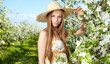 beautiful blonde in a spring garden
