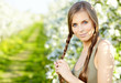 beautiful blonde in a spring garden
