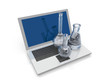 Laptop Software Concept with laboratory glassware