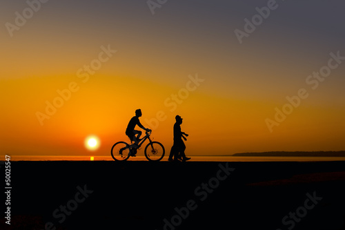 Photo: cyclist on sunset cyclist on sunset