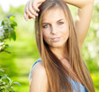 beautiful blonde in a spring garden