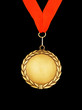 Gold medal with red ribbon isolated on black