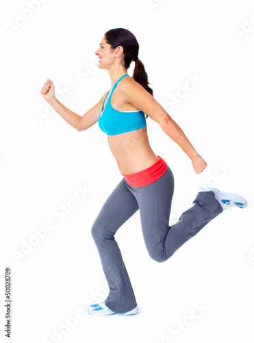 Photo: Young beautiful fitness woman. Young beautiful fitness woman.
