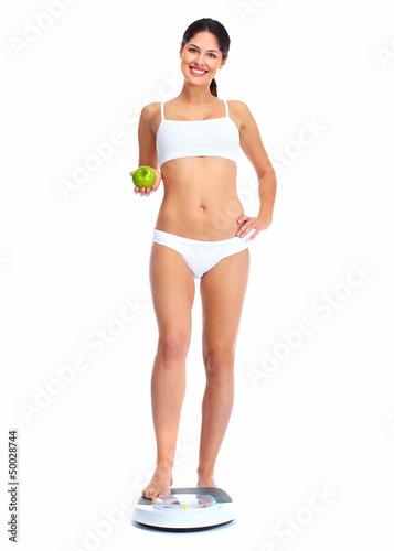 Photo: Young beautiful fitness woman. Young beautiful fitness woman.
