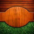 wooden background with grass