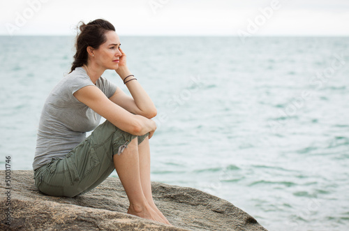 Photo: Sad woman deep in though Sad woman deep in though