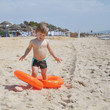 Cute boy on the beach