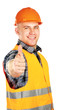 Photo: A young construcation worker showing ok A young construcation worker showing ok