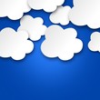 White clouds on blu sky. Paper-cut effect
