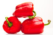 fresh red bell peppers isolated on white
