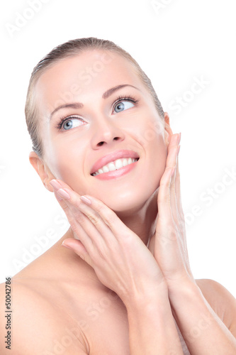 Photo: Beauty face of beautiful woman with clean fresh skin - isolated Beauty face of beautiful woman with clean fresh skin - isolated