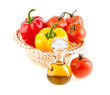 bottle with olive oil on the background of the wattled dish with