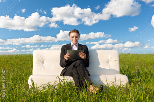 Photo: Business woman with touch pad Business woman with touch pad