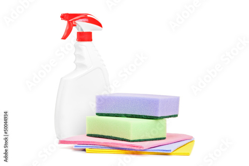 Photo: Studio shot of a cleaning spray and sponges Studio shot of a cleaning spray and sponges
