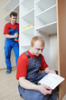 Photo: Wardrobe joiners at installation work Wardrobe joiners at installation work