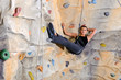 woman on rock wall