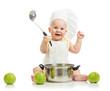 funny adorable baby with green apples isolated on white backgrou