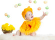 baby boy dressed in Easter chicken costume