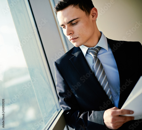 Photo: Businessman in office Businessman in office