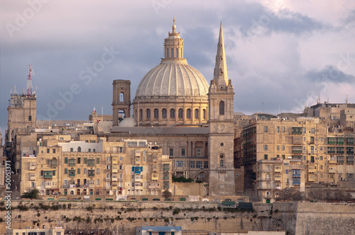 La Valletta View of the cupola St. Pauls Cathedral and belltower Charmelite Church at the evening