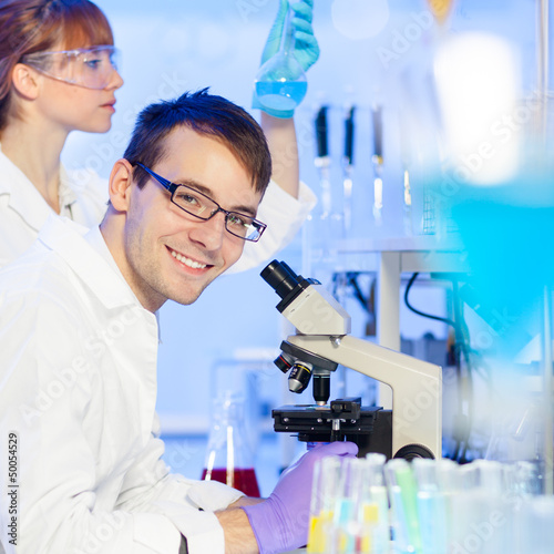Photo: Health care professionals in lab. Health care professionals in lab.