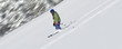 child skiing in powder snow