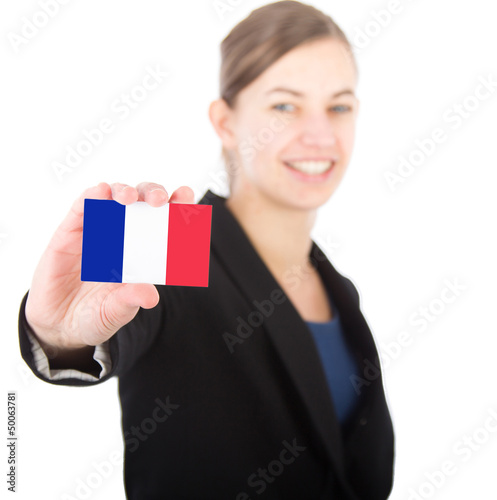 Photo: business woman holding a card with the French flag business woman holding a card with the French flag