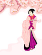Vintage japanese geisha enjoying cherry tree blossom