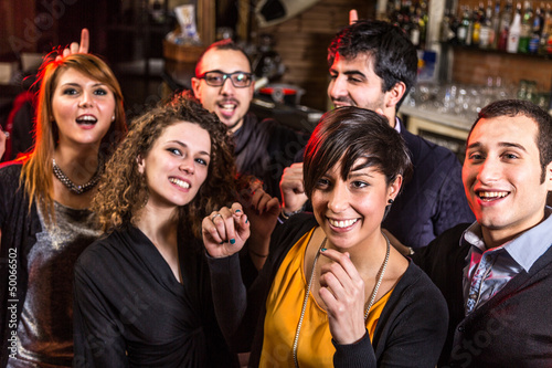 Photo: Group of Friends in a Night Club Group of Friends in a Night Club