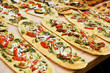 loafs with tomato, vegetables and cheese