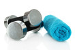 Dumbbells with towel isolated on white