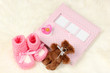 Baby photo album on white carpet