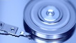 Closeup view of working hard disk drive.