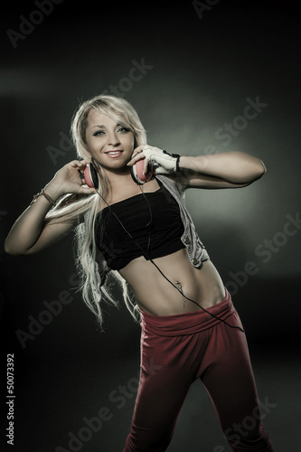 Photo: Blonde Sexy woman with headphones Blonde Sexy woman with headphones