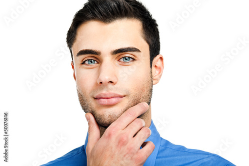 Photo: Young businessman portrait isolated on white Young businessman portrait isolated on white