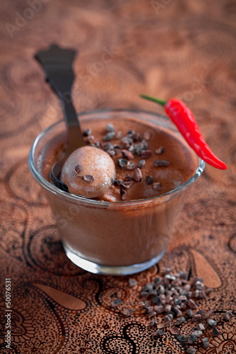 Photo: Chocolate mousse with chilli and cocoa, selective focus Chocolate mousse with chilli and cocoa, selective focus