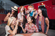 Group of Laughing People with Pizza