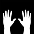 two hands on a black background