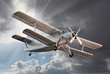 Old biplane on the sky.