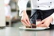 Cook, pastry chef, in hotel or restaurant kitchen