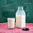 Photo: Bottle and a glass of milk Bottle and a glass of milk