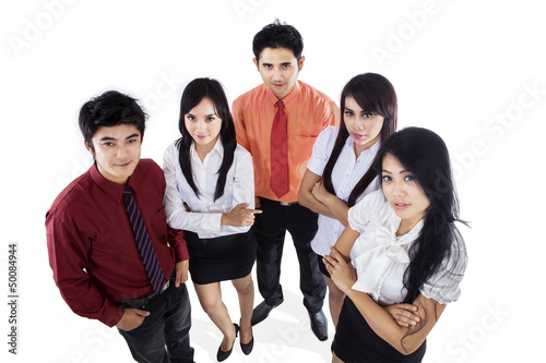 Photo: Confident business team isolated Confident business team isolated