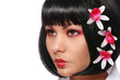 geisha makeup, beautiful girl with red flowers in her hair