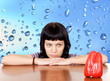 Photo: Pensive girl lookin a red pepper Pensive girl lookin a red pepper