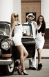 Photo: Young people with a retro car Young people with a retro car