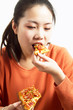 Girl eating pizza