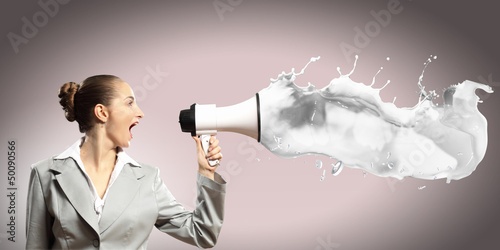 Photo: businesswoman with megaphone businesswoman with megaphone